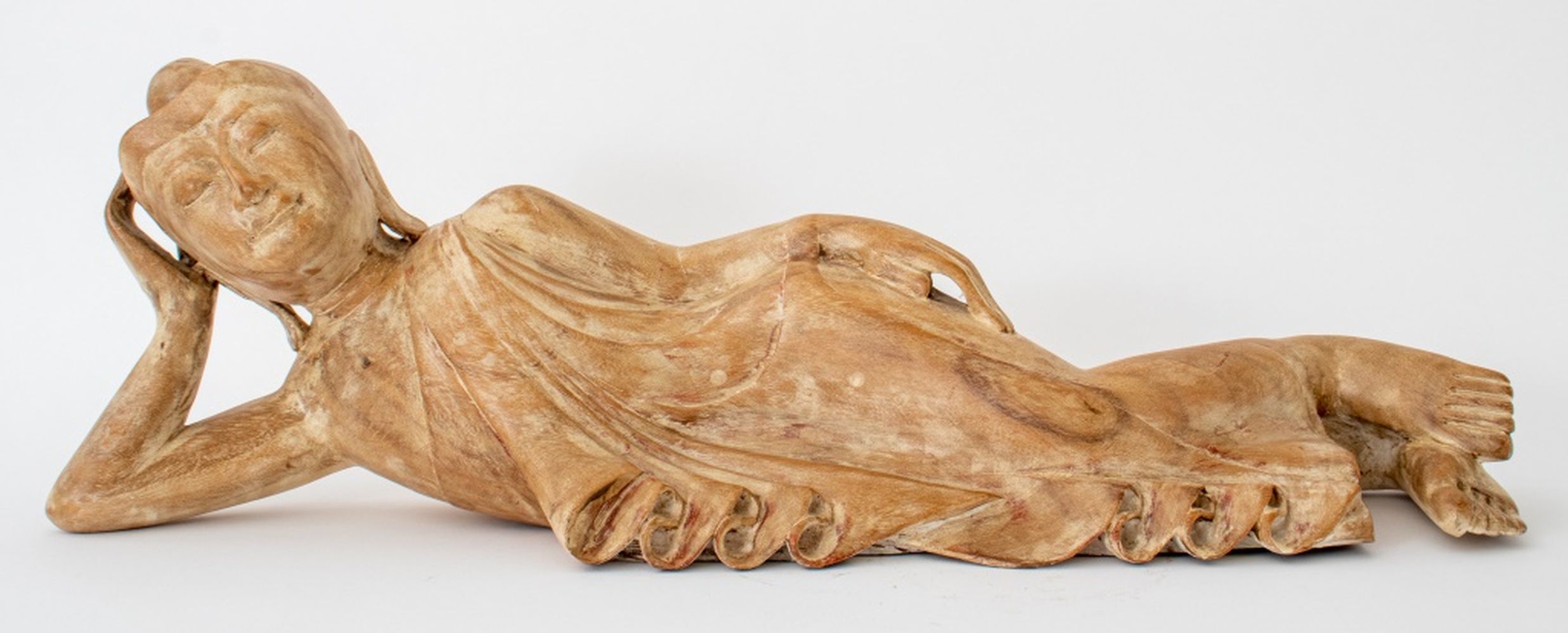 INDONESIAN FIGURE OF A RECLINING