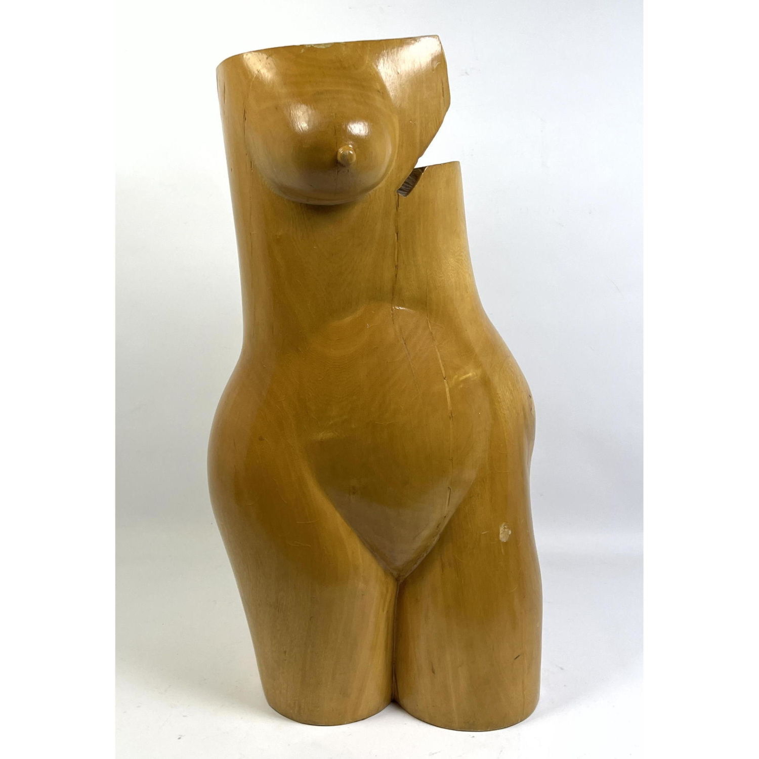 Carved wood Female Torso sculpture.