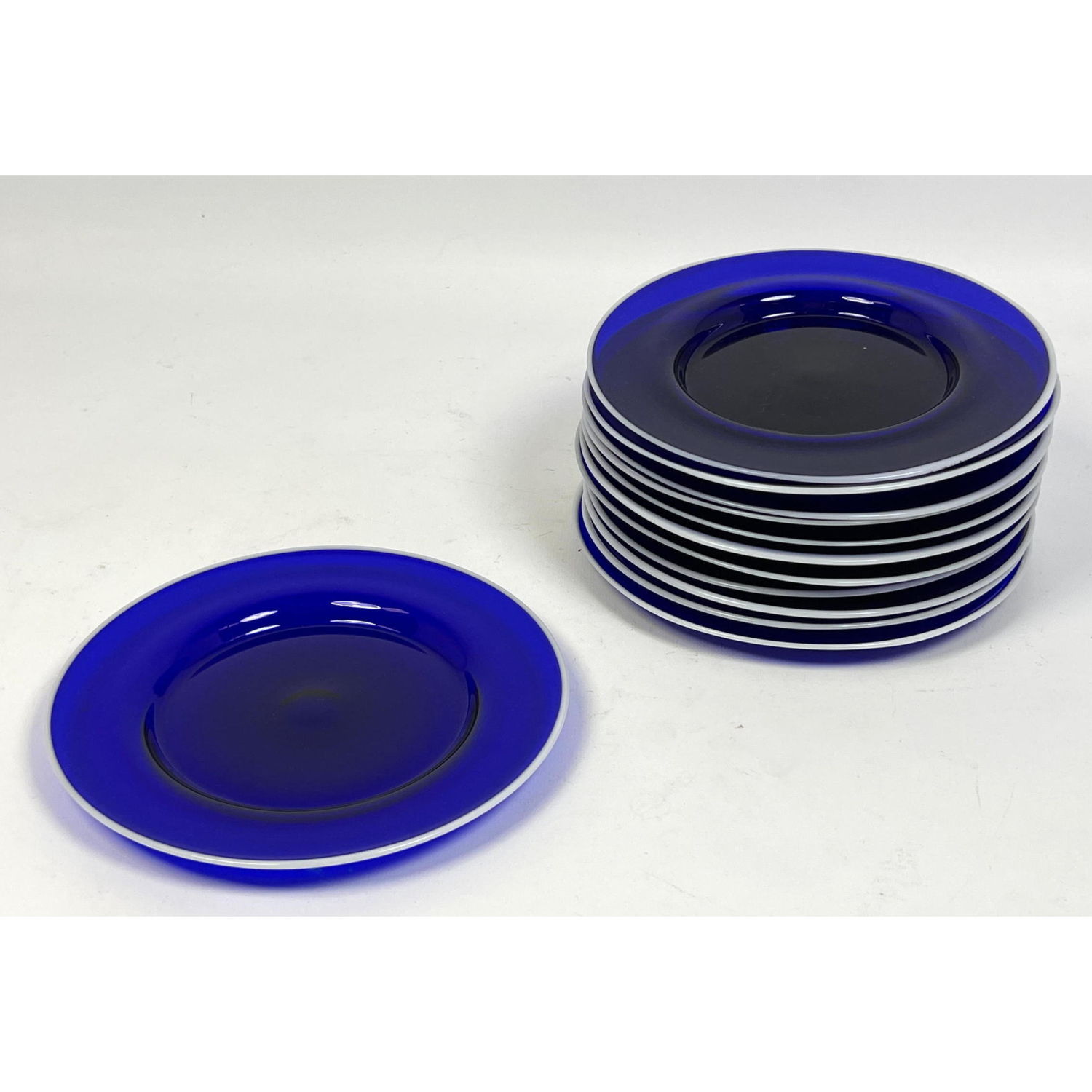 Set of 12 hand blown blue glass plates