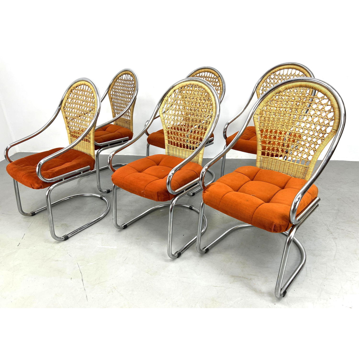 Set 6 Wicker back Chrome dining chairs