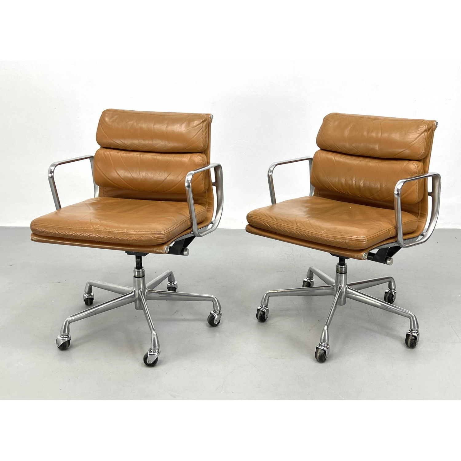 Pair Charles Eames Aluminum Group Chairs.