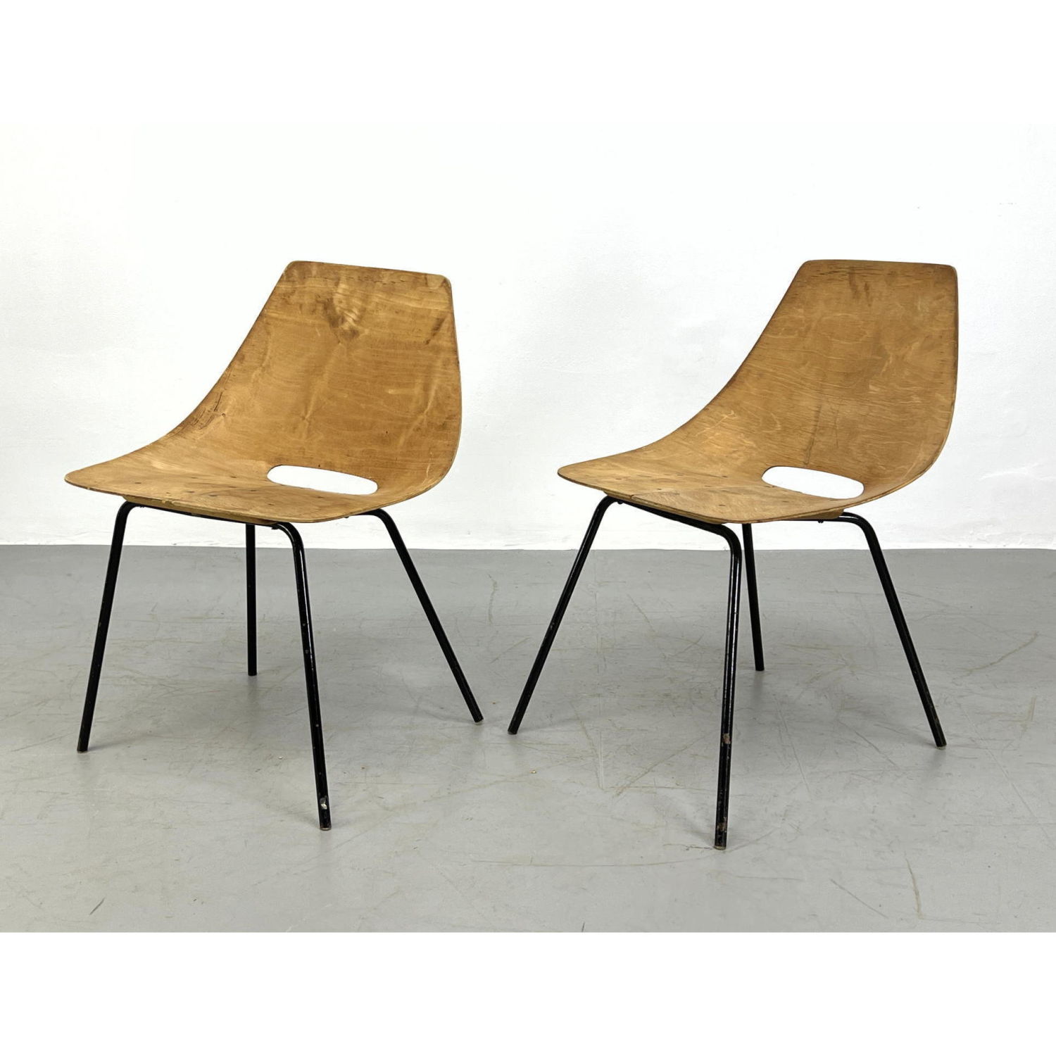 Pair PIERRE GUARICHE Tonneau Chairs.