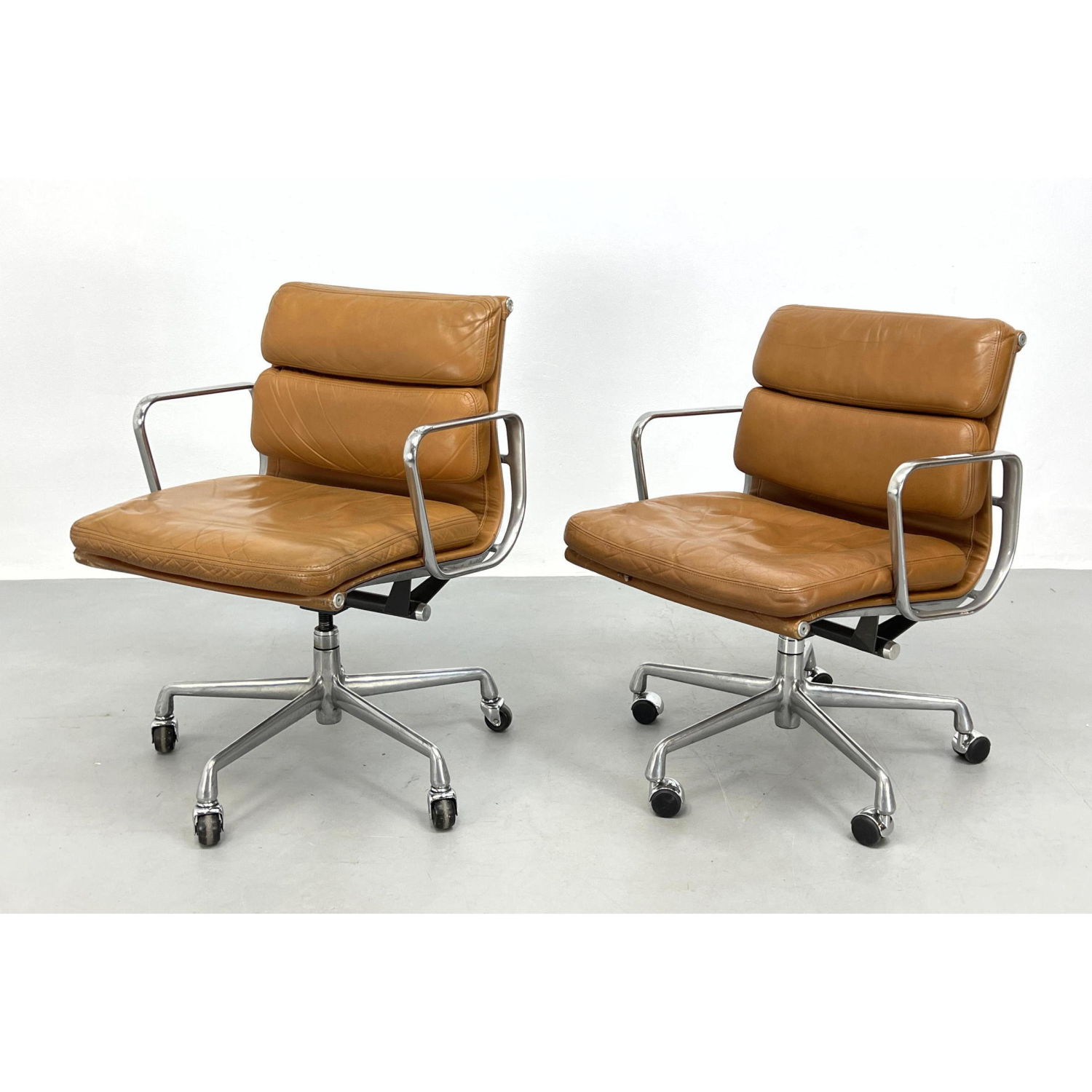 Pair Charles Eames Aluminum Group Chairs.