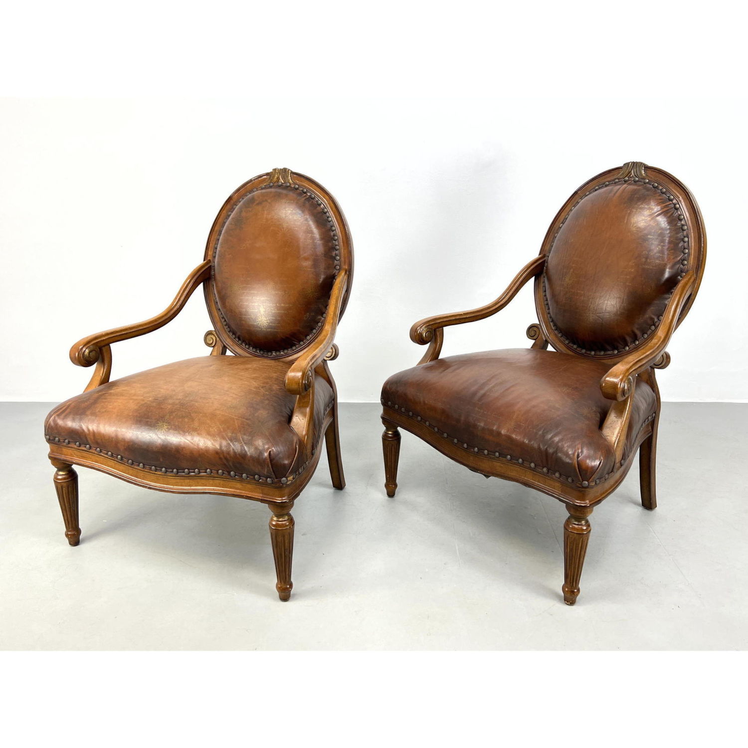 Pr COUNCILL Brown Leather Open Arm Chairs.