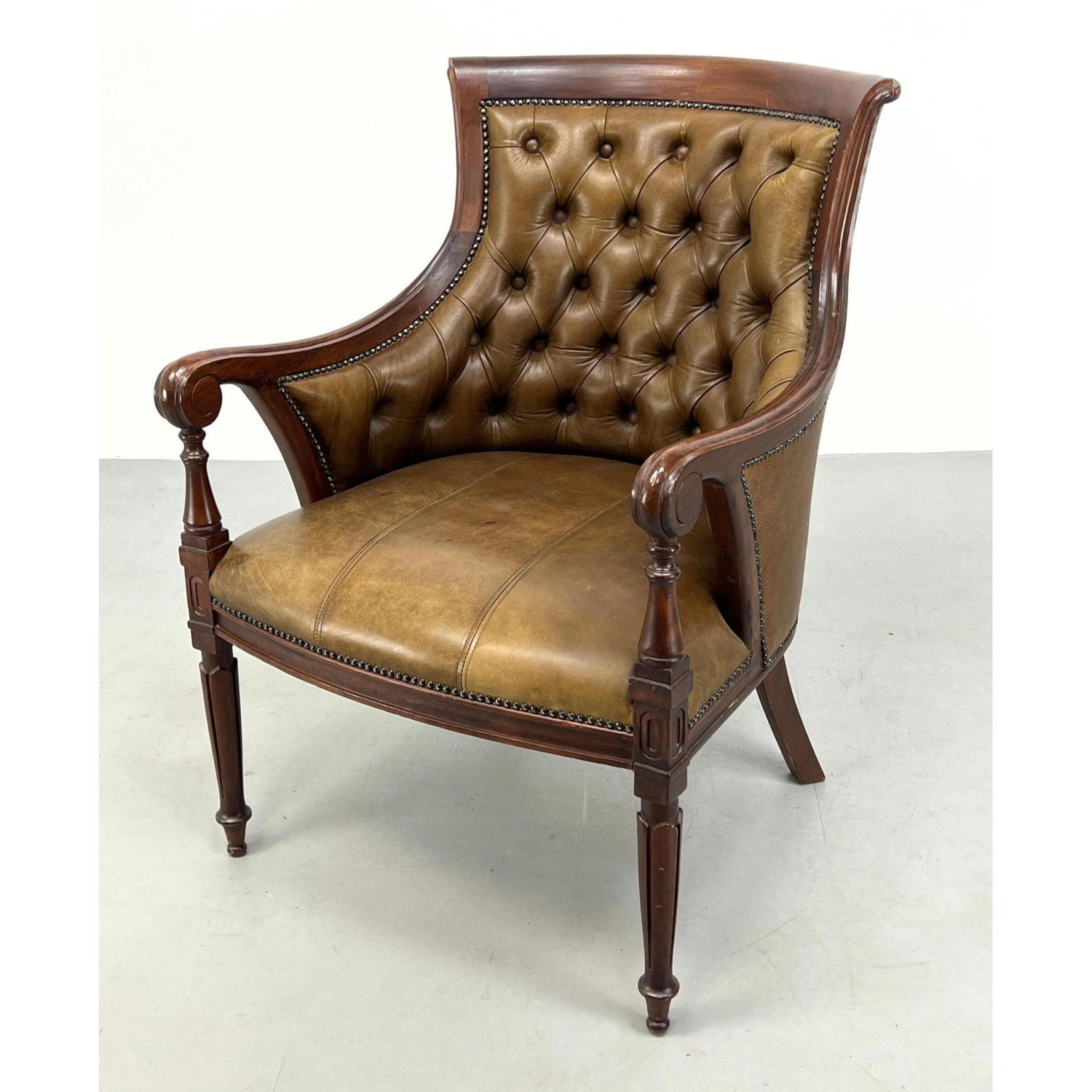 Tufted Leather Vintage Arm Chair.