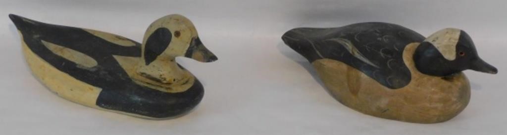 TWO CARVED AND PAINTED WOODEN DECOYS  2c18a4