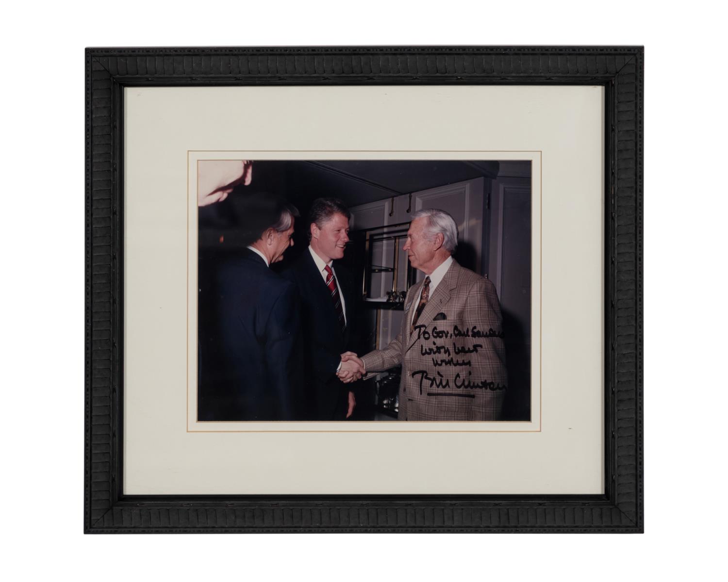 PRES. CLINTON WITH GOV. SANDERS SIGNED