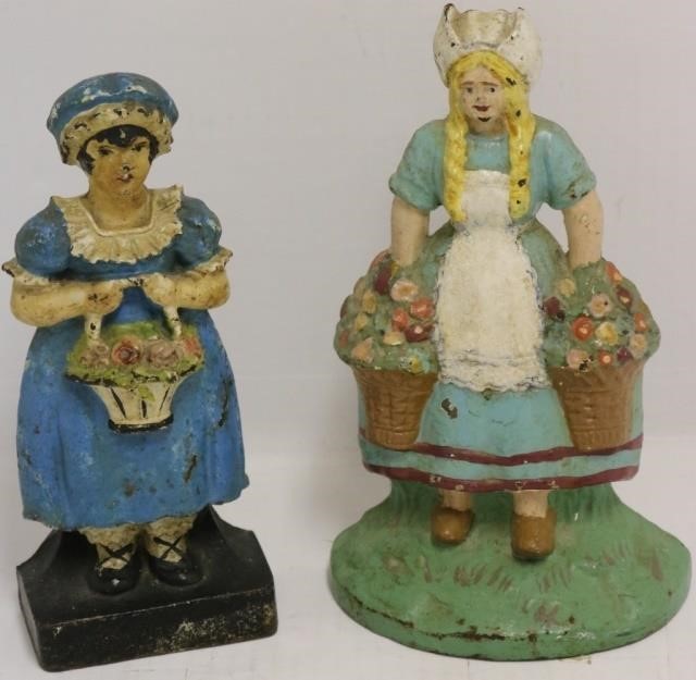 2 EARLY 20TH C CAST IRON DOORSTOPS  2c2ace