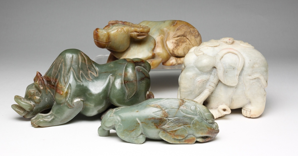 FOUR ASIAN STONE CARVED ANIMALS.