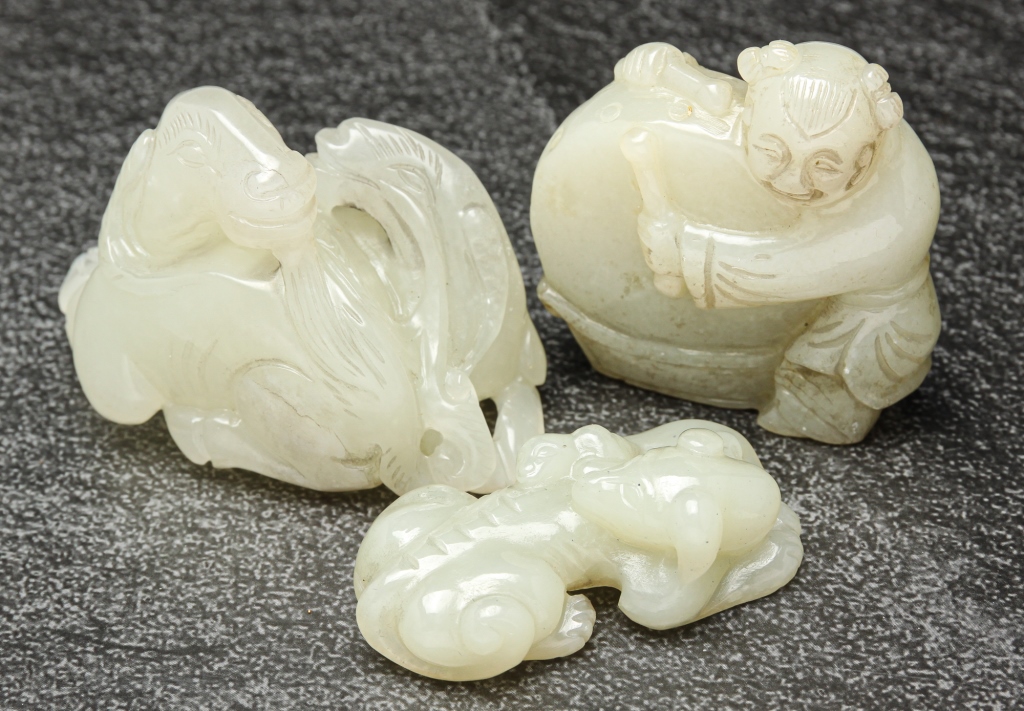 THREE CHINESE WHITE JADE CARVINGS.