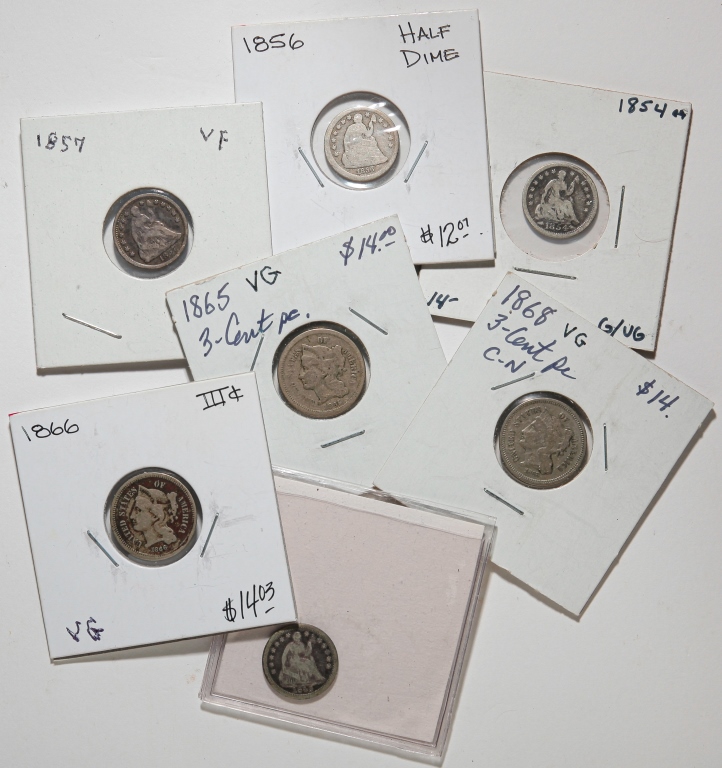 FOUR SEATED HALF DIMES AND THREE