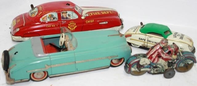 LOT OF 4 WIND-UP VEHICLE TOYS.