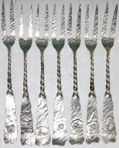 SET OF SEVEN HANDMADE HAMMERED