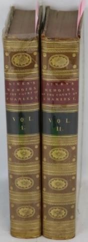 TWO LEATHER BOUND BOOKS TITLED