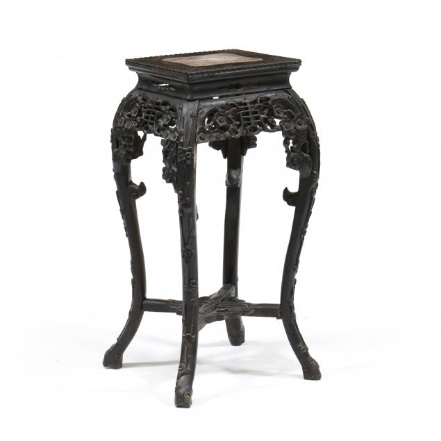 A CHINESE CARVED WOODEN STAND WITH 2c51a3