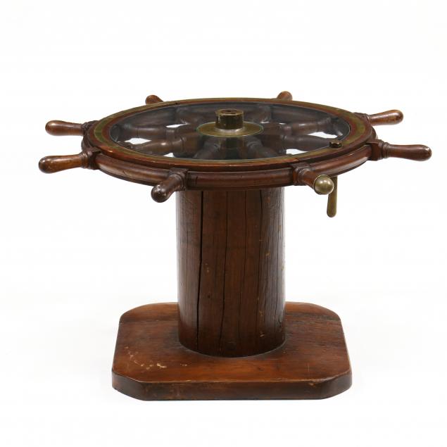 ANTIQUE SHIP'S WHEEL MOUNTED AS