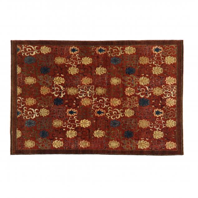 ORIENTAL RUG Brown field with repeating