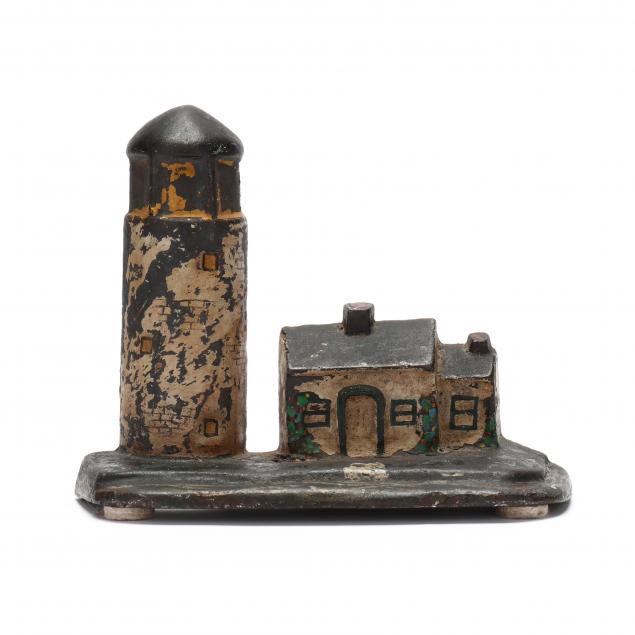 LIGHTHOUSE AND KEEPER CAST IRON 2c524c