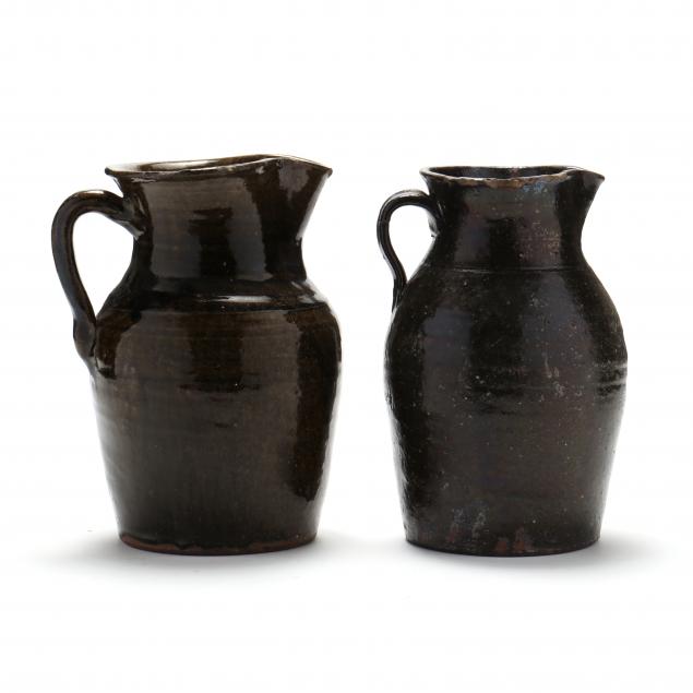 TWO ALKALINE GLAZED TABLE PITCHERS  2c56d4