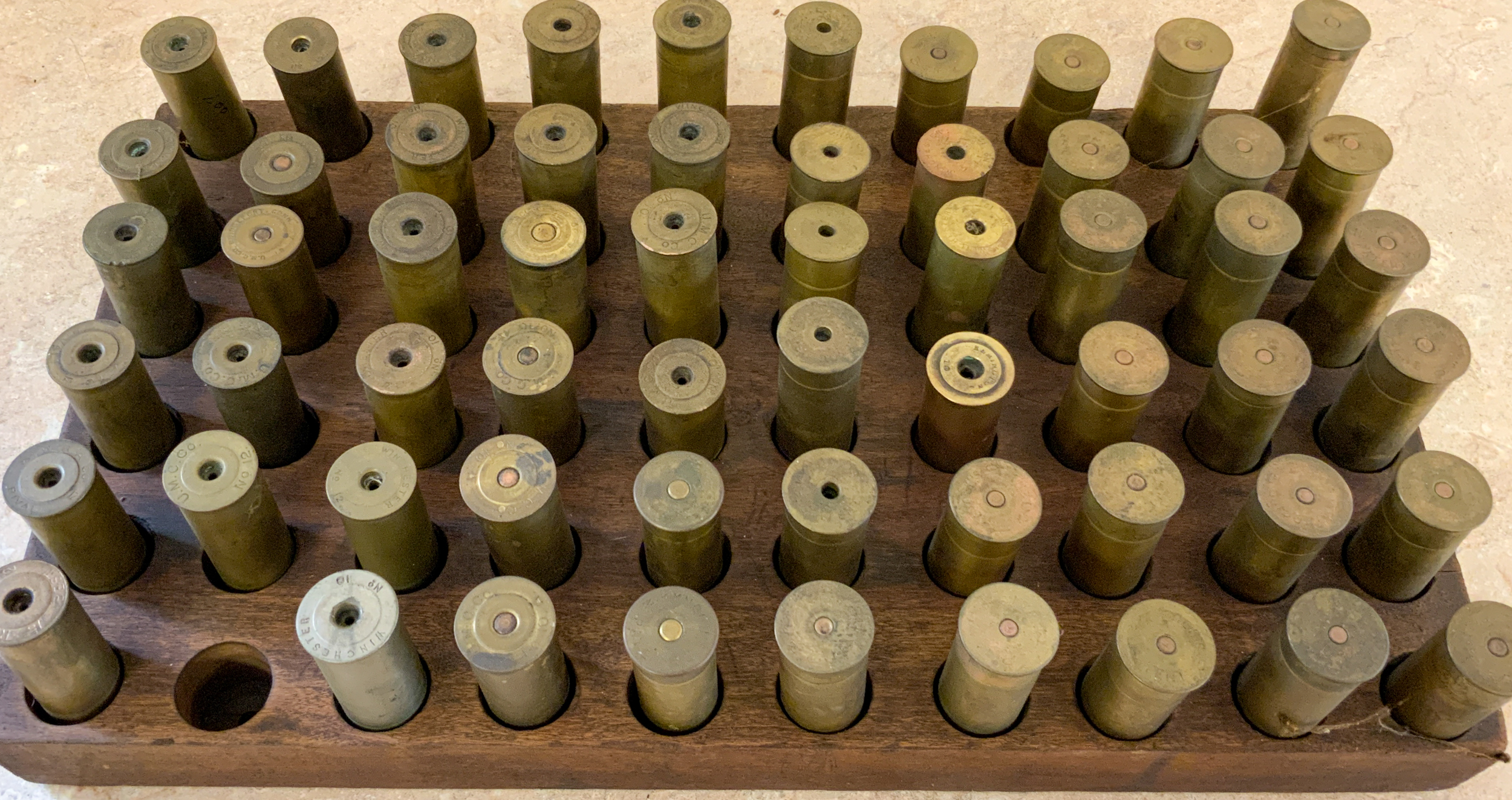 BRASS SHOT SHELL COLLECTION WITH WOODEN