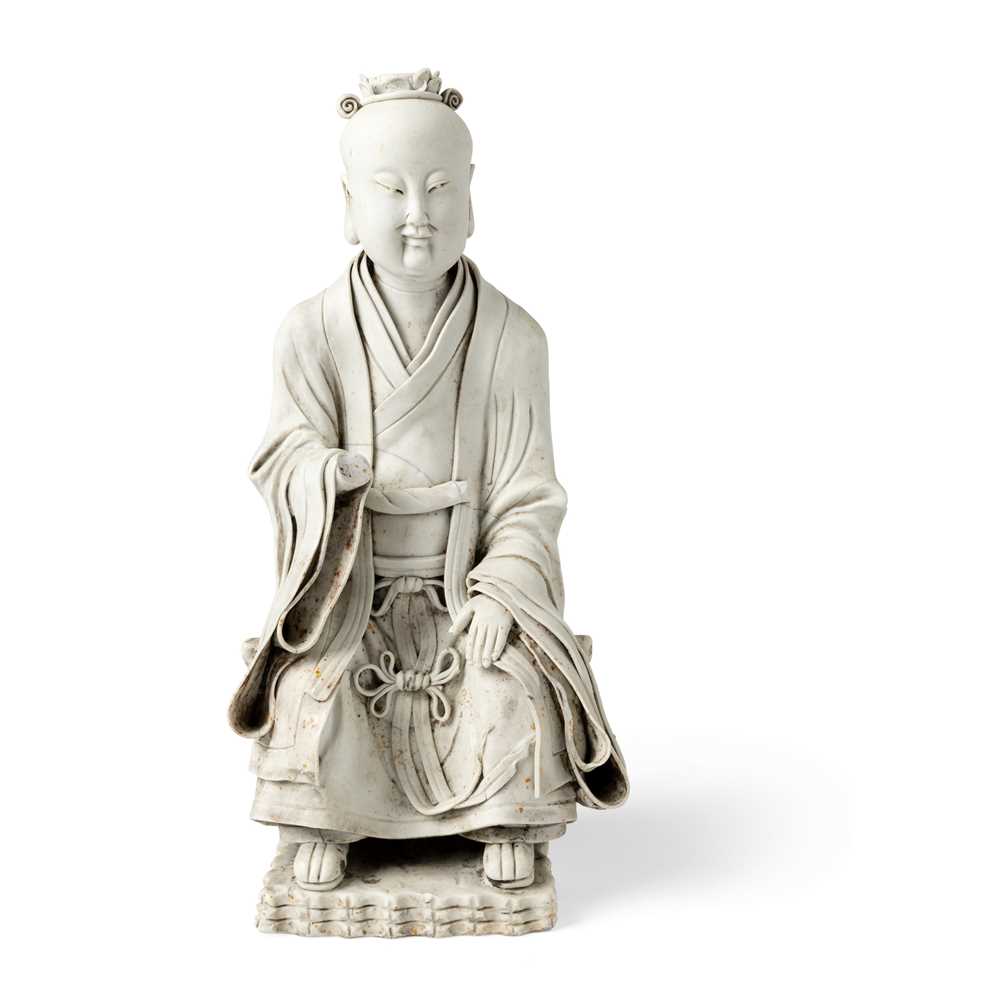 CARVED PORCELAIN FIGURE OF A SEATED 2cabad