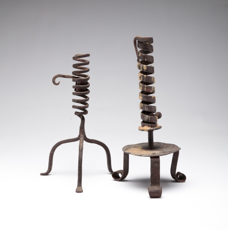 TWO AMERICAN WROUGHT IRON CANDLESTICKS.