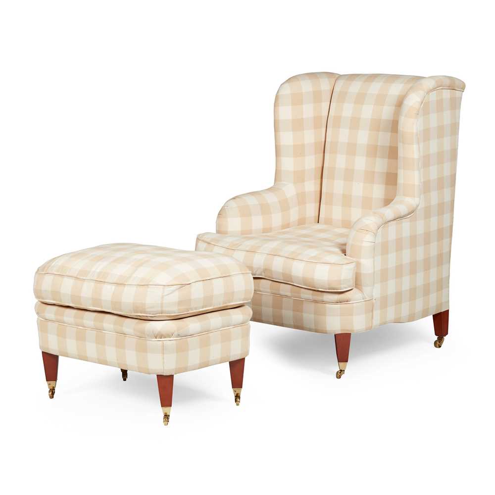 UPHOLSTERED WING ARMCHAIR AND OTTOMAN
OF