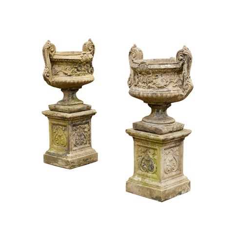 PAIR OF COMPOSITION STONE URNS 2cd5ca
