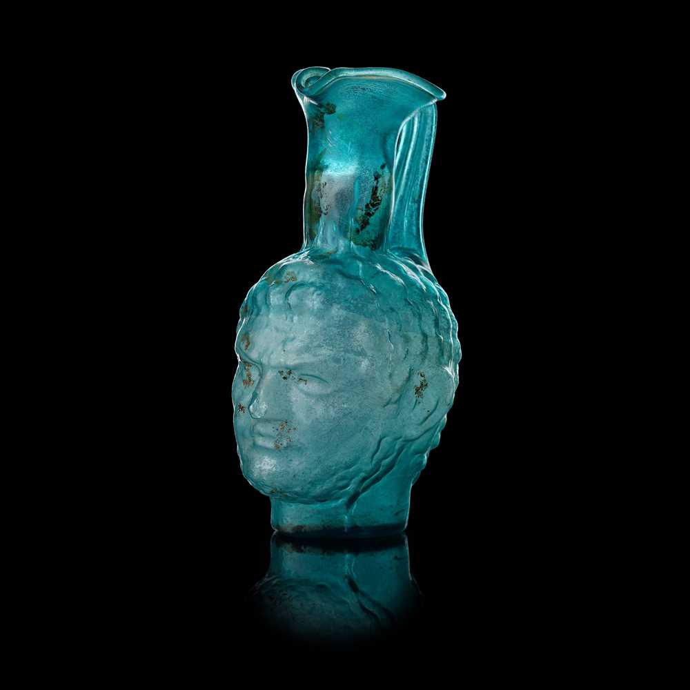 ROMAN STYLE PORTRAIT GLASS VESSEL
AFTER