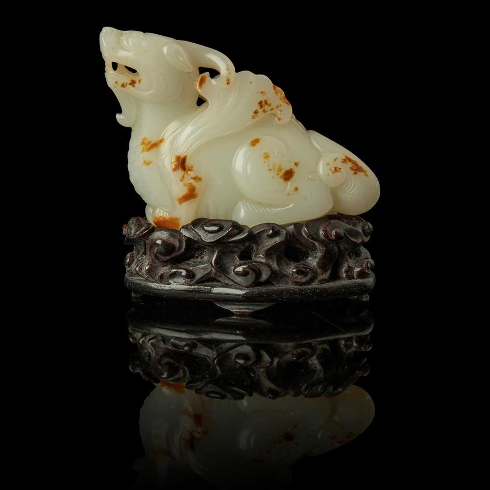 WHITE JADE WITH RUSSET SKIN CARVING