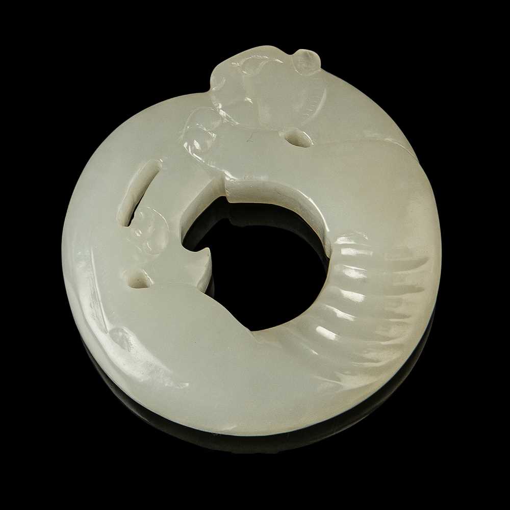WHITE JADE CARVING OF A TIGER PENDANT QING 2cbe7c