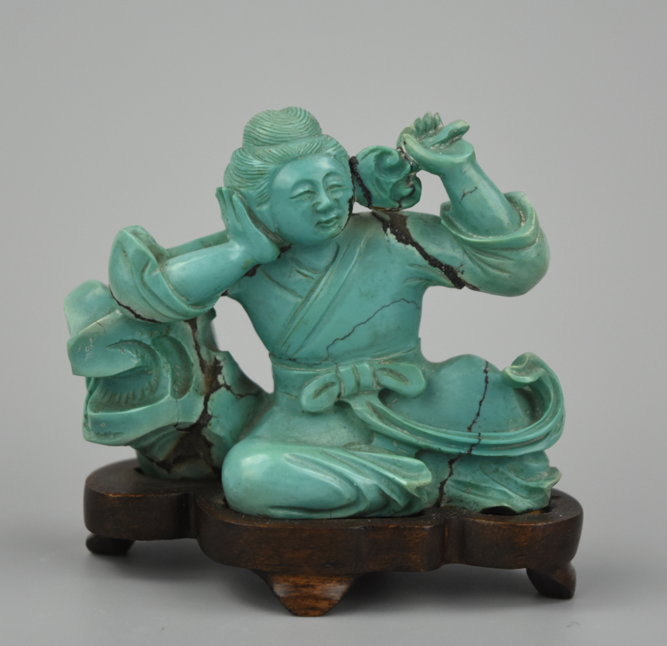 CHINESE CARVED TURQUOISE MAN RECLINING