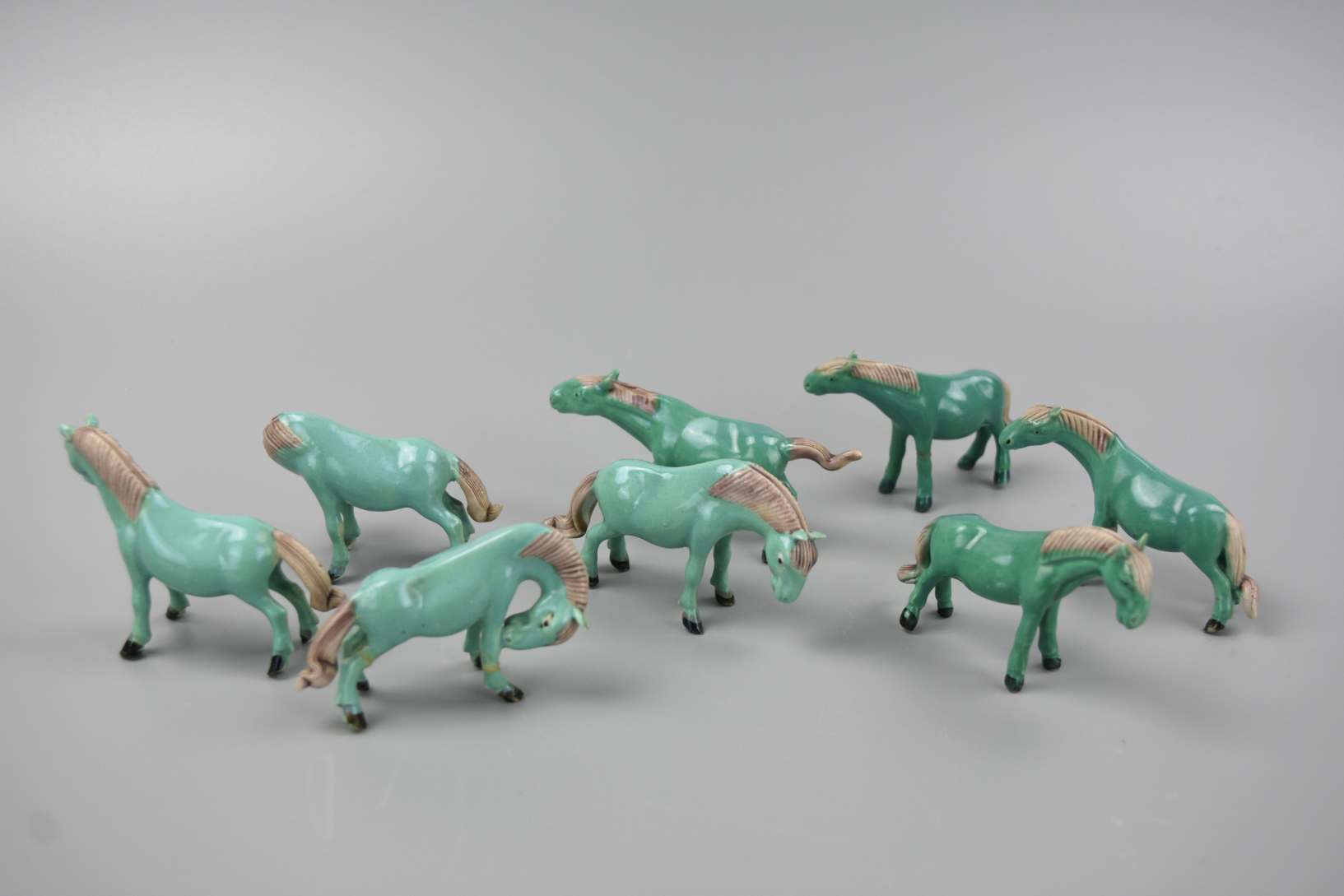 (8) TURQUOISE PORCELAIN HORSES IN VARIED