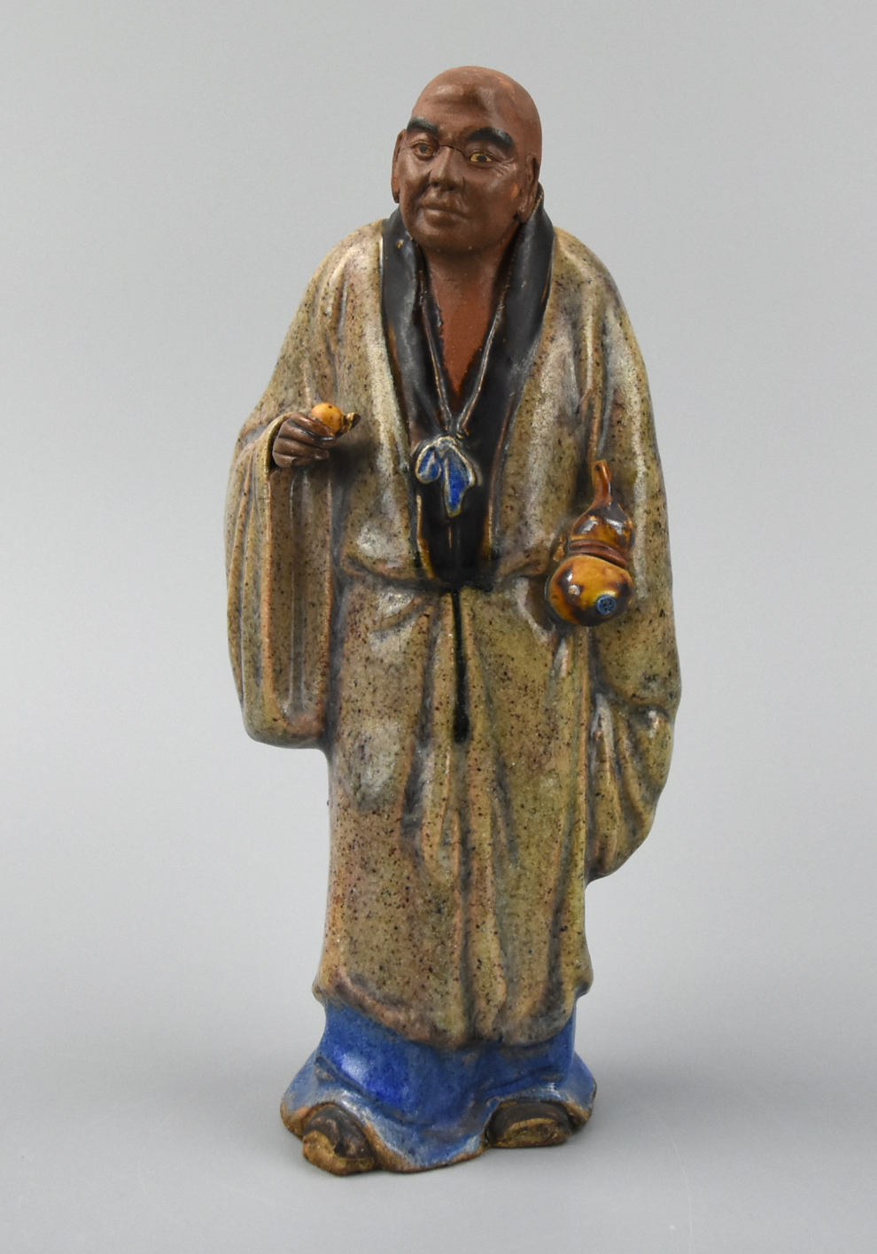 CHINESE SHIWAN WARE MONK FIGURE,QING