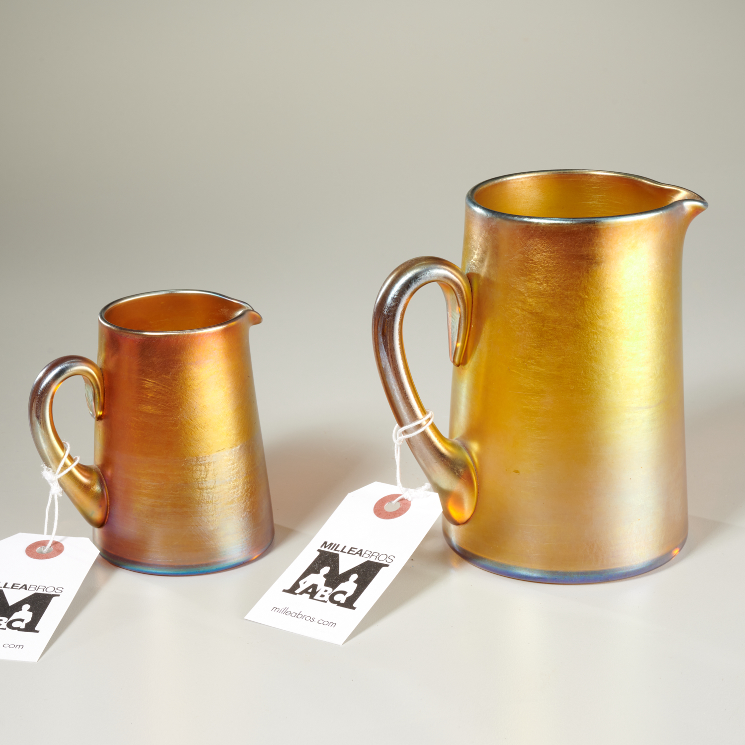 (2) FAVRILE GLASS PITCHERS, INCL. TIFFANY