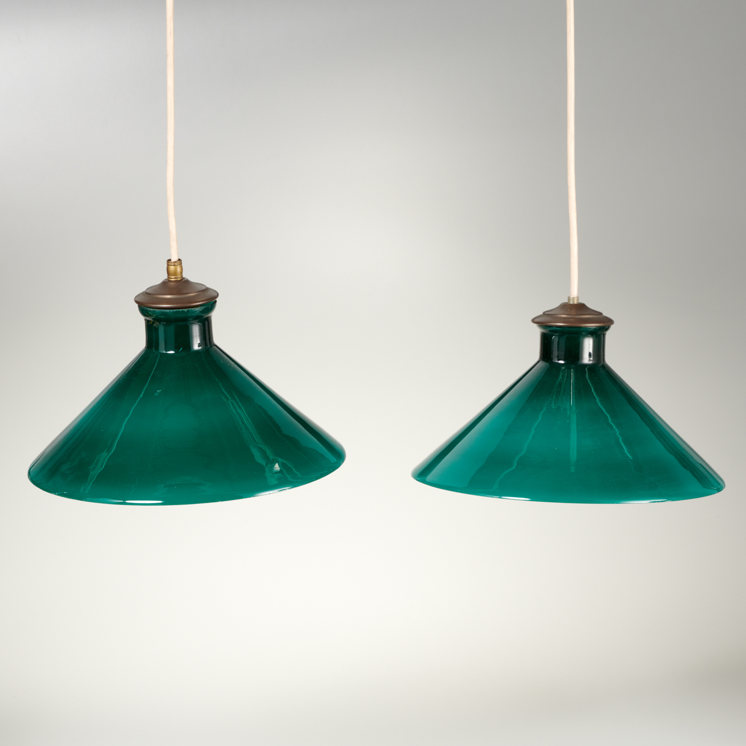 PAIR VINTAGE CONICAL GREEN GLASS