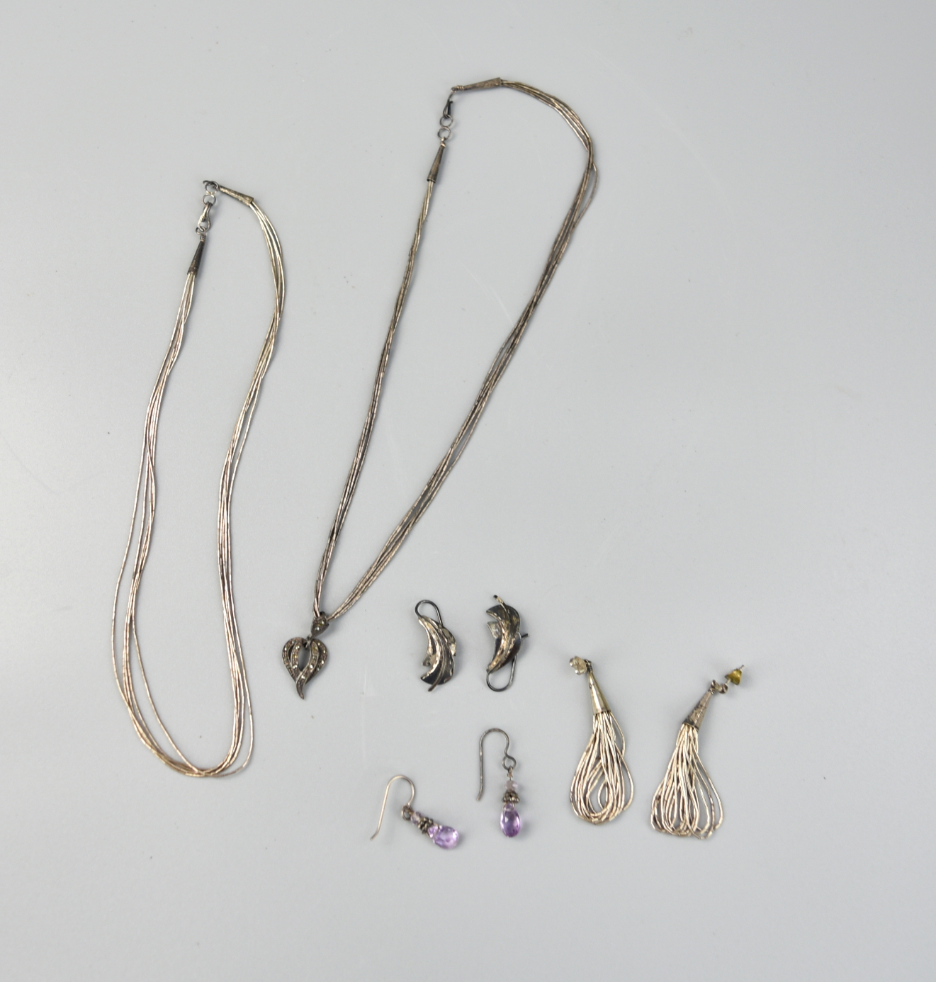 2 SILVER NECKLACES,3 PAIRS OF EARRINGS