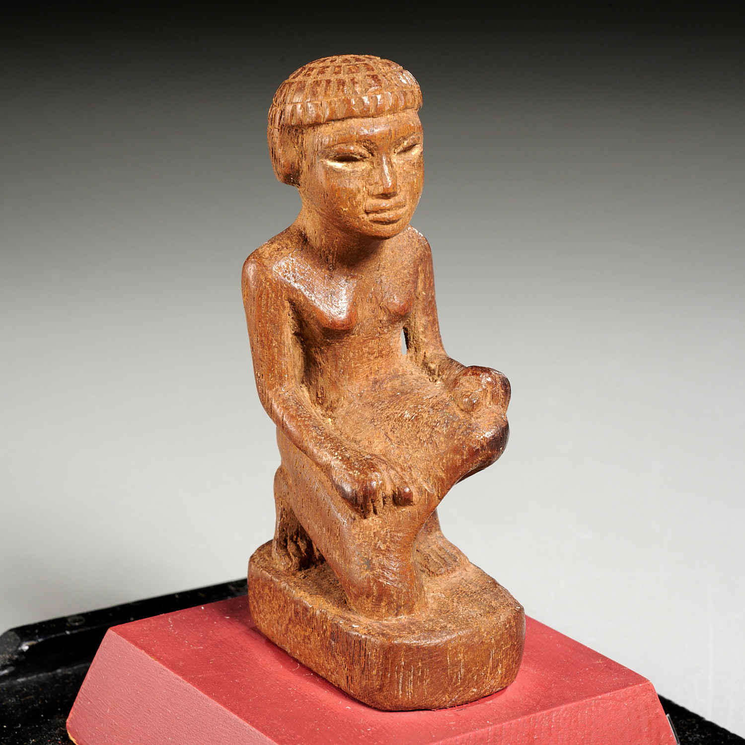 ANCIENT EGYPTIAN CARVED KNEELING WOMAN,