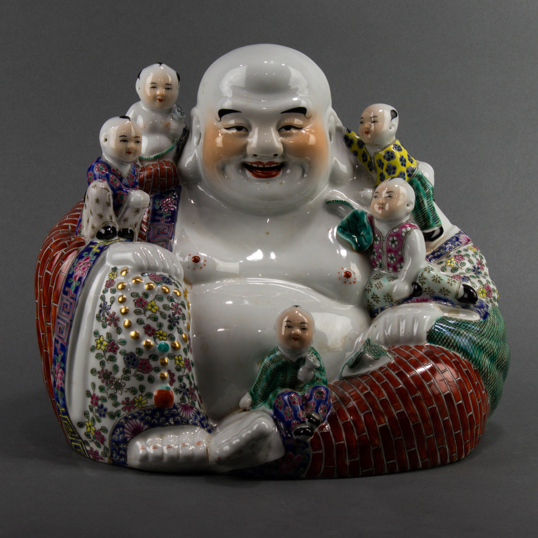 CHINESE FAMILLE ROSE FIGURE OF