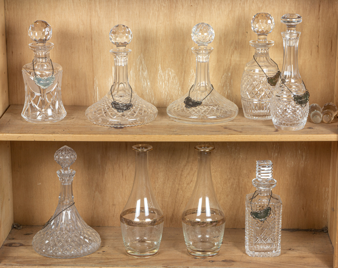 (LOT OF 9) CUT GLASS DECANTERS:,