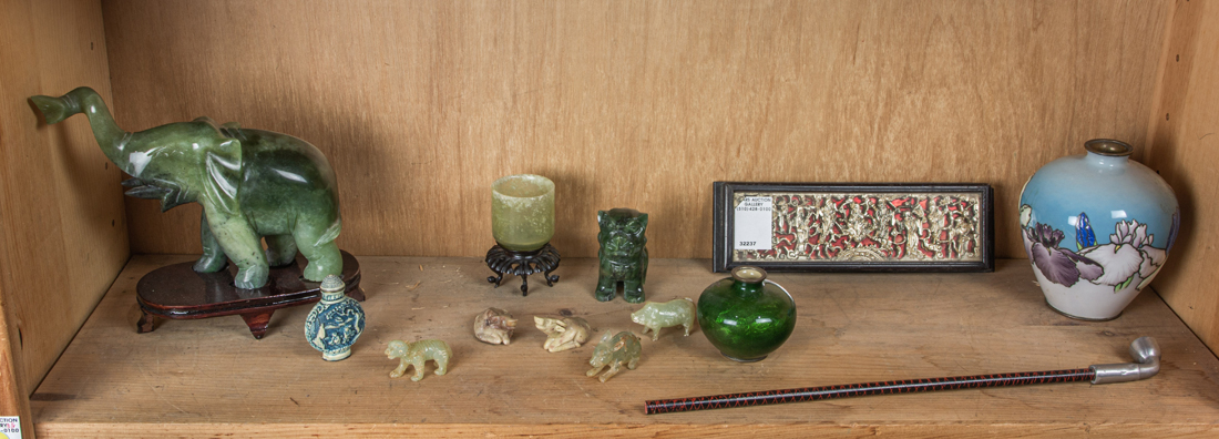 SHELF OF ASIAN DECORATIVE ITEMS