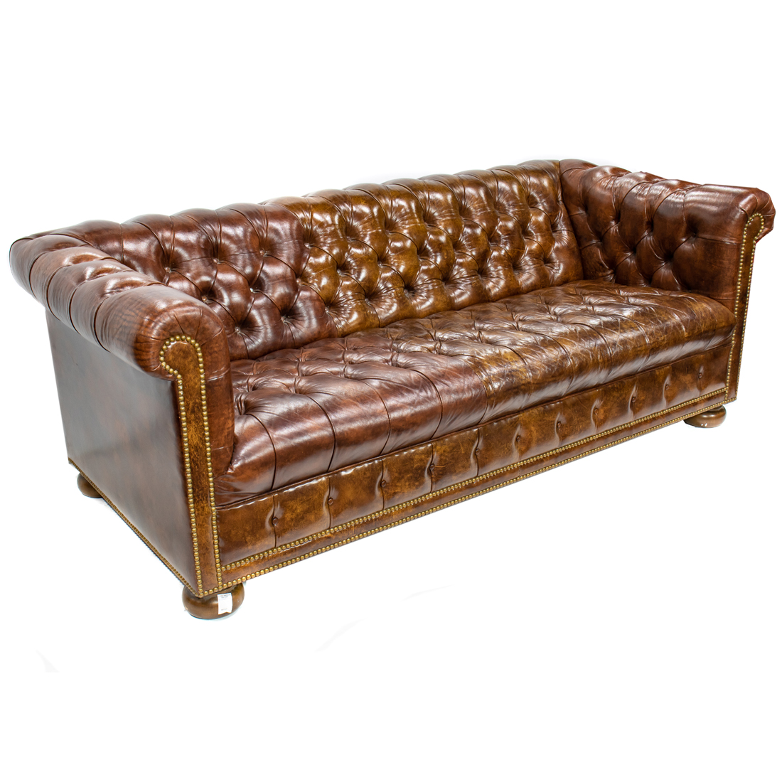 A CHESTERFIELD TUFTED SOFA A Chesterfield