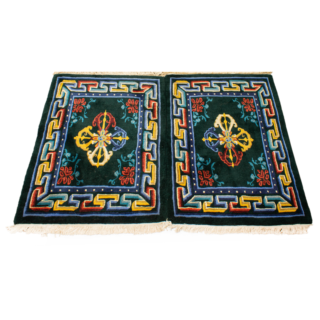 A PAIR OF TIBETAN CARPETS A pair