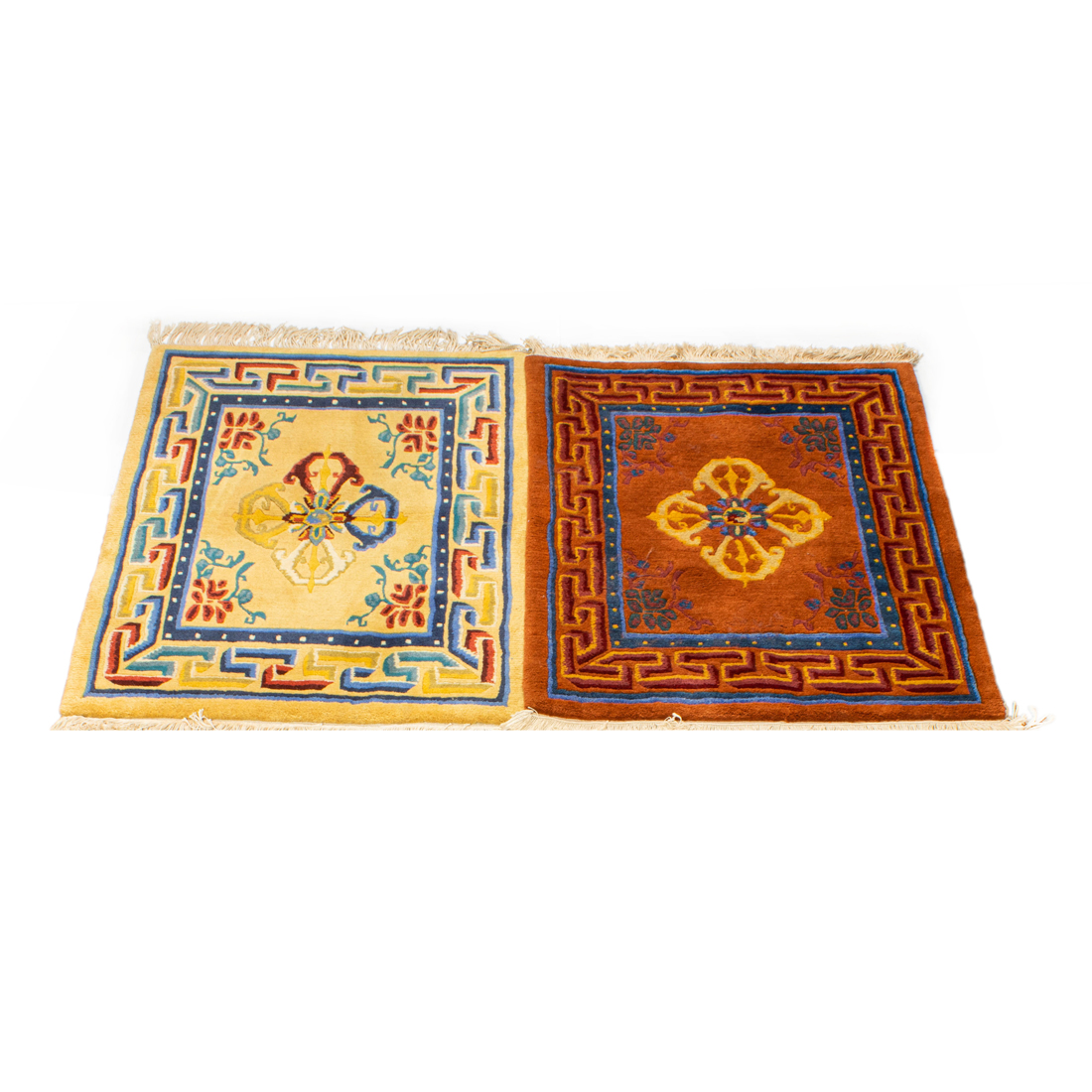 TIBETAN WOOL RUG A pair of Tibetan