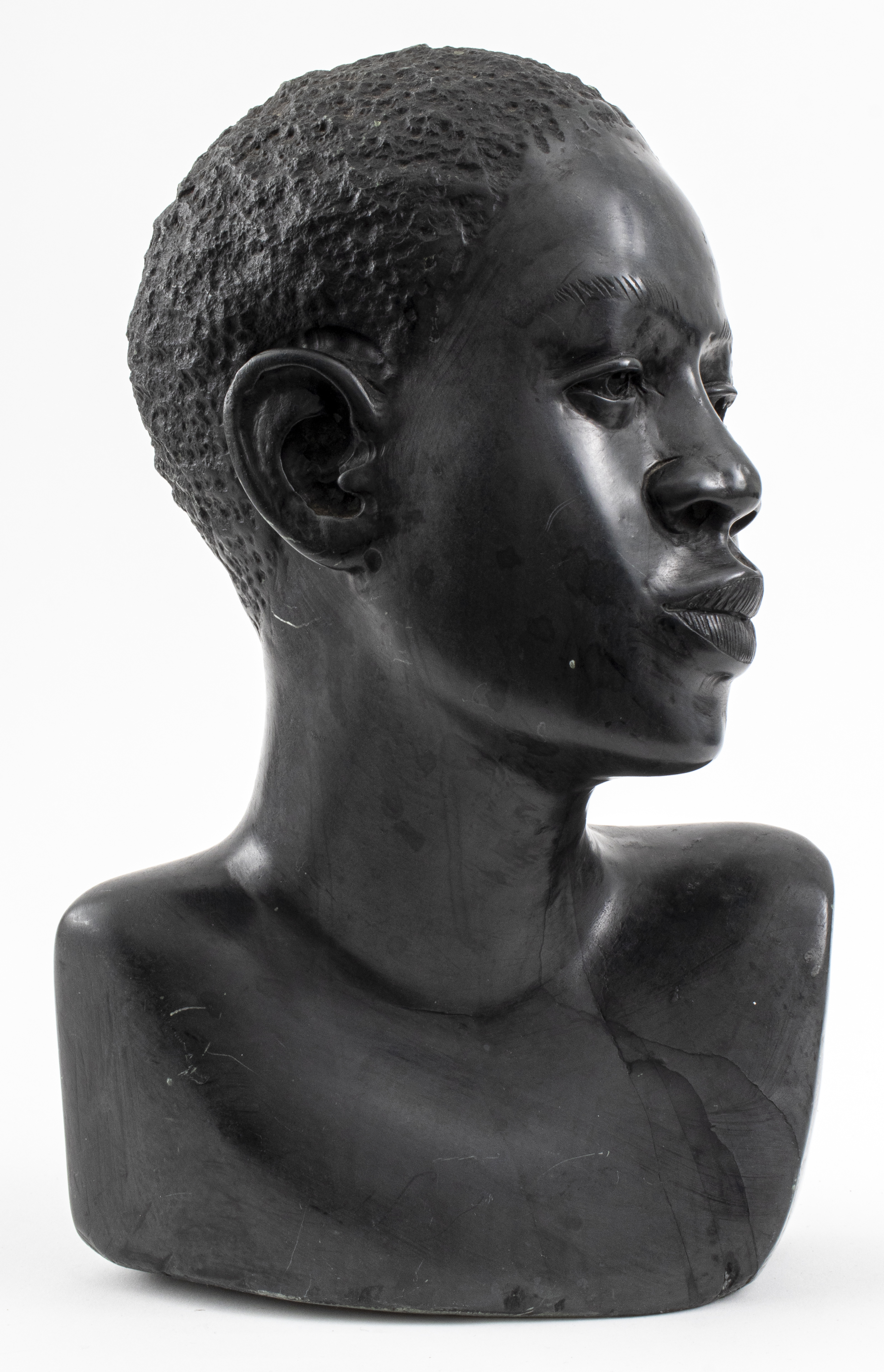 MARBLE BUST OF A YOUNG AFRICAN