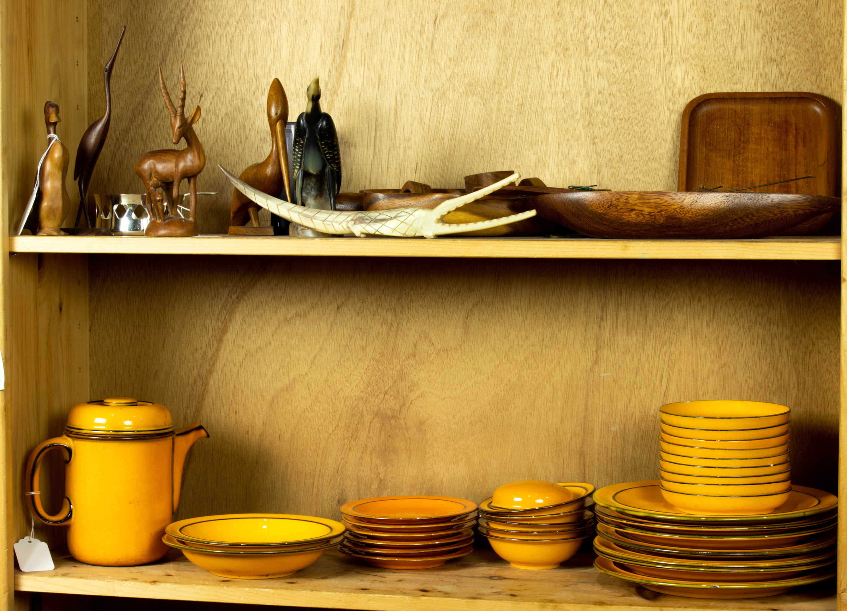 TWO SHELVES OF DECORATIVE ART Two