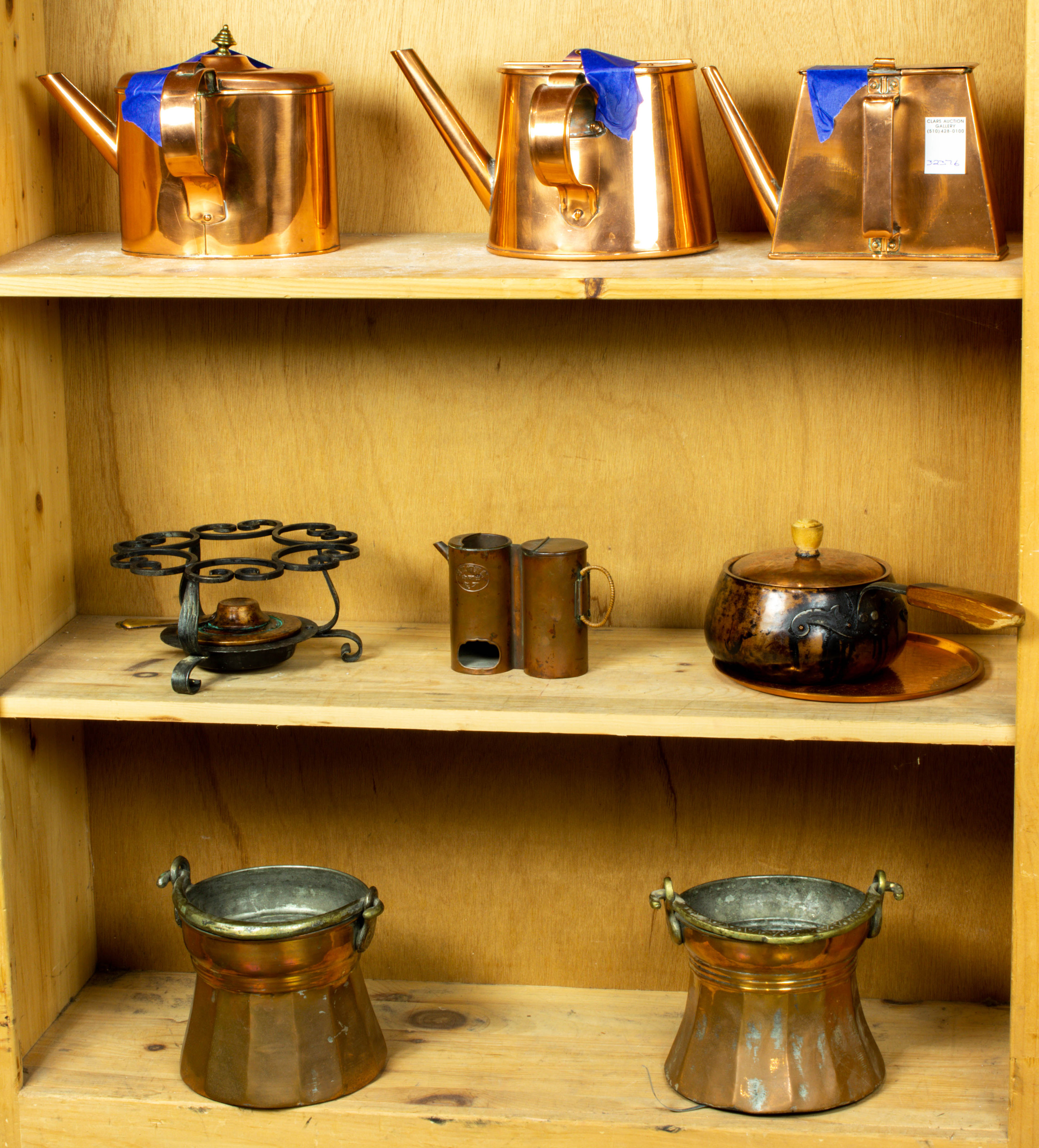 THREE SHELVES OF MOSTLY COPPERWARE POTS