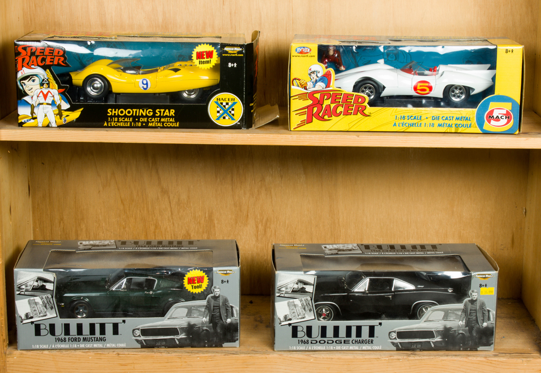 FOUR MODEL CARS IN ORIGINAL BOXES