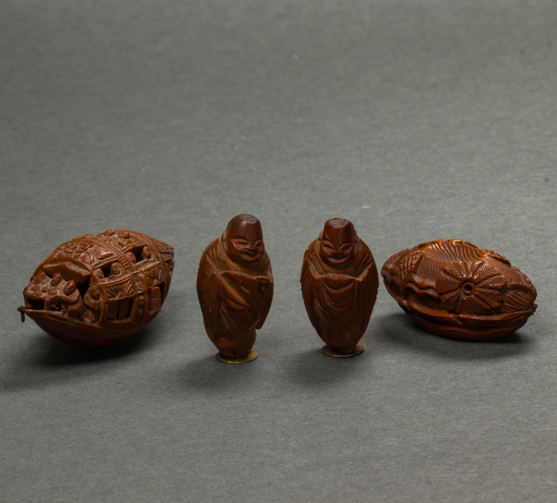 GROUP OF CHINESE OLIVE PIT CARVINGS