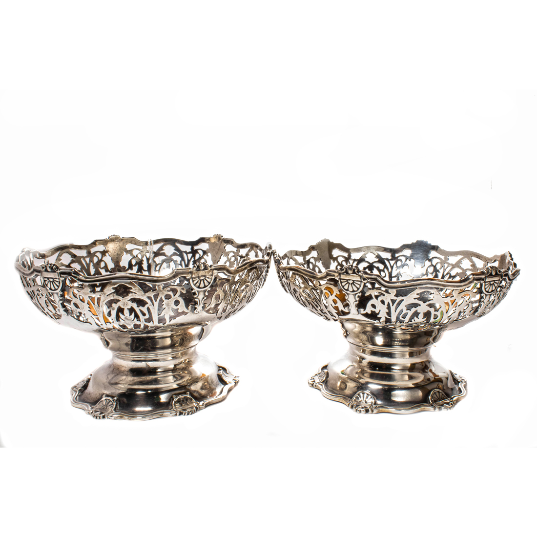 AN ENGLISH PAIR STERLING FOOTED COMPOTES